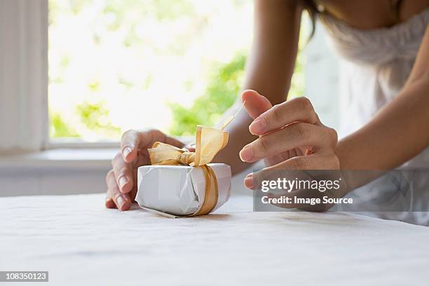 woman with small gift - tiny hands stock pictures, royalty-free photos & images