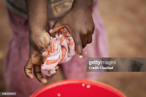 child washing cloth - daily bucket bildbanksfoton och bilder