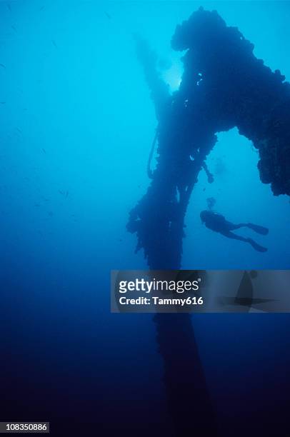 wwii wreck prior to sinking after volcanic eruption in 1994 - rabaul stock pictures, royalty-free photos & images