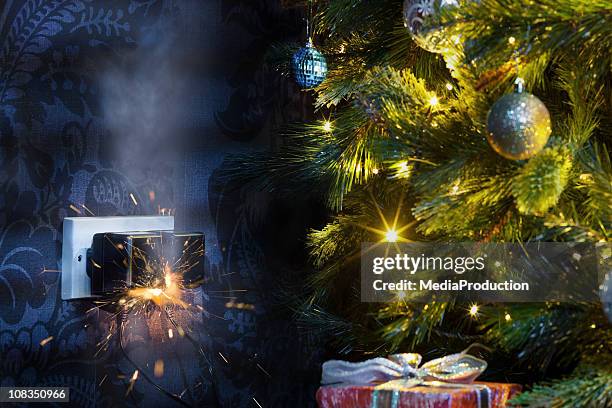 christmas disaster - house with christmas lights stock pictures, royalty-free photos & images