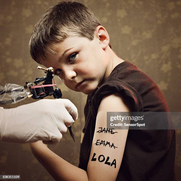 kid tattooed - name tattoos stock pictures, royalty-free photos & images