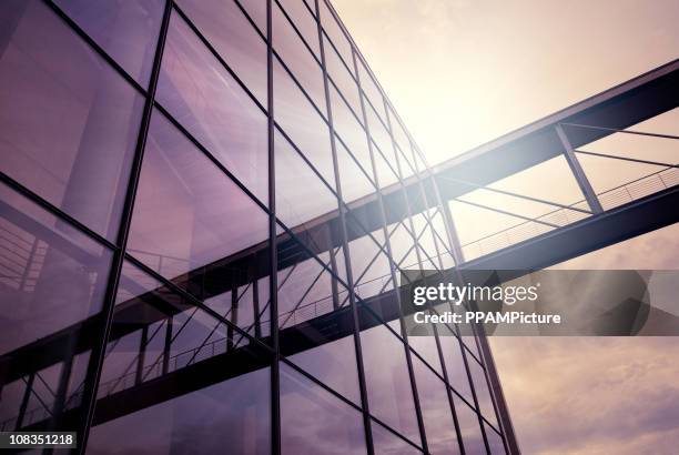 purple office building - light burst abstract centre stock-fotos und bilder