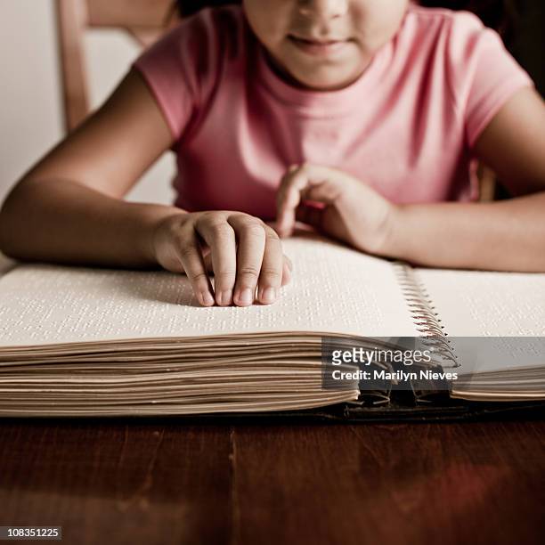 child reading braille - blind girl stock pictures, royalty-free photos & images