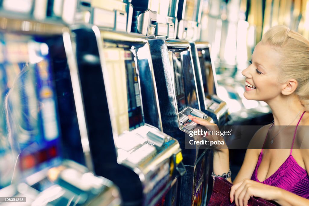 Girl plays games in the casino