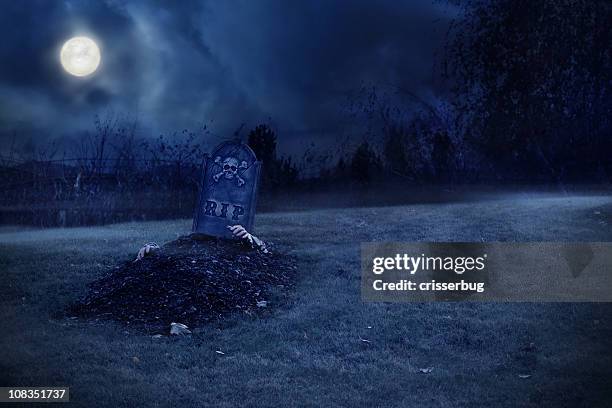 zombie rising from grave - cemetery stock pictures, royalty-free photos & images