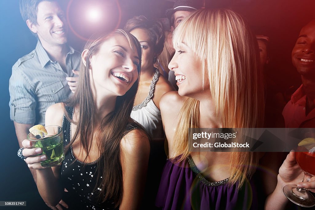 Group of friends having fun at nightclub