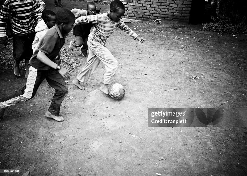 African Boys Playing Soccer