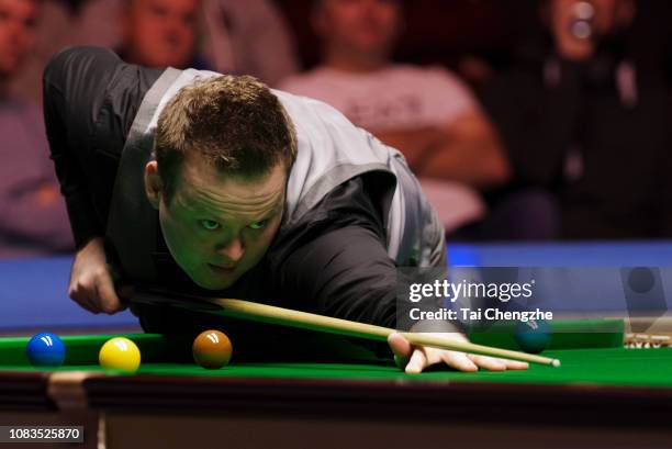 Shaun Murphy of England plays a shot during the final match against Mark Allen of Northern Ireland on day 7 of 2018 BetVictor Scottish Open at...