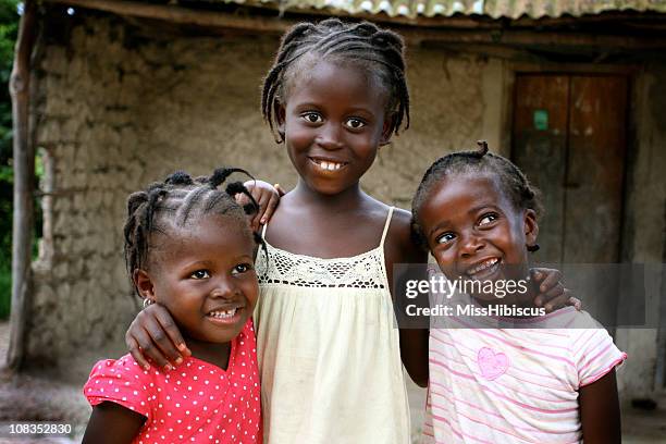 happy african girls - elfenbenskusten bildbanksfoton och bilder