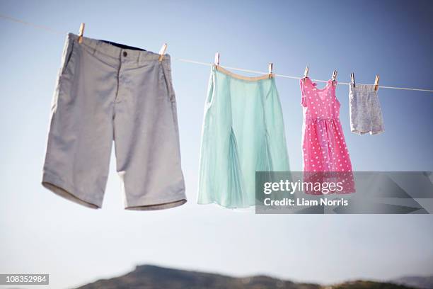 family washing line - drying stock pictures, royalty-free photos & images