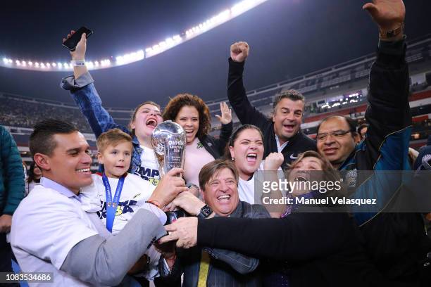 Miguel Herrera coach of America celebrates with the Championship Trophy after the final second leg match between Cruz Azul and America as part of the...