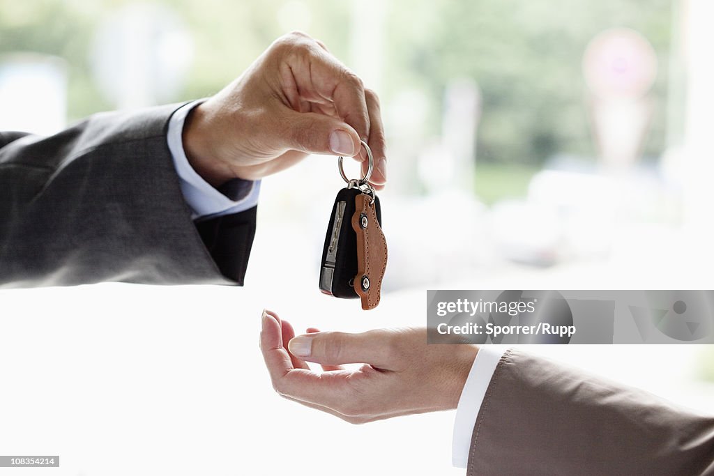 Handing over key