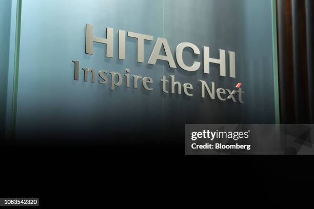 Hitachi logo sits on display during a news conference with Toshiaki Higashihara, president and chief executive officer Hitachi Ltd. , in Tokyo,...