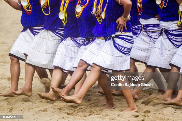 tribal dance at hornbill festival - tribal dancing stock pictures, royalty-free photos & images