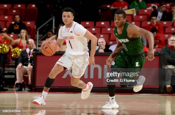 Anthony Cowan Jr. #1 of the Maryland Terrapins handles the ball against the Loyola Greyhounds at Xfinity Center on December 11, 2018 in College Park,...