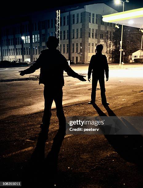 dangerous streets - victim silhouette stock pictures, royalty-free photos & images