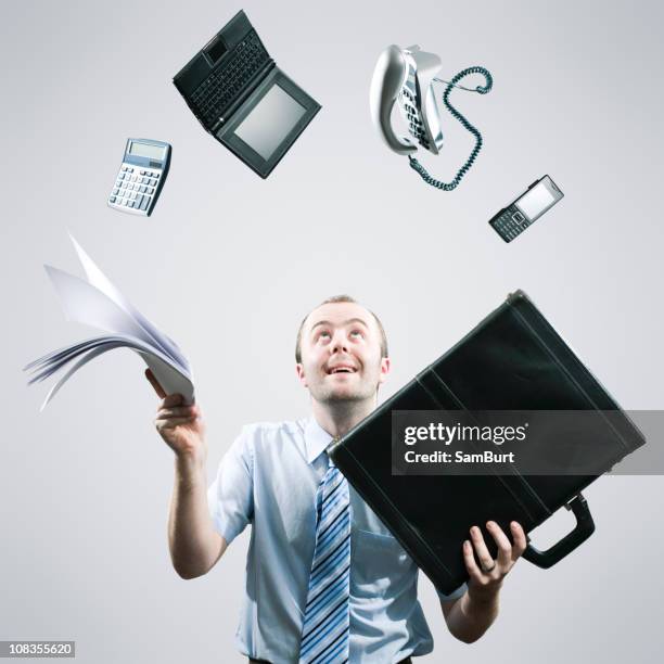happy juggling businessman - juggling stock pictures, royalty-free photos & images