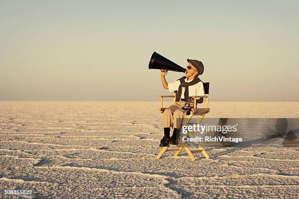 azione! - vintage movie director foto e immagini stock