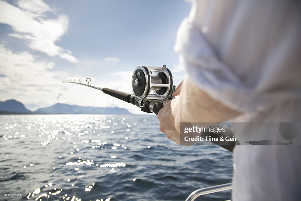 Man fishing in sea