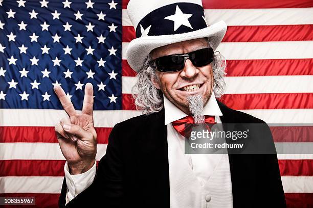 uncle sam with sunglasses and peace sign - uncle sam stock pictures, royalty-free photos & images