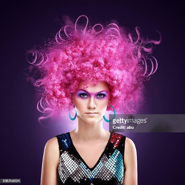 beautiful girl in a fancy dress and funny pink wig - afro wig stock pictures, royalty-free photos & images