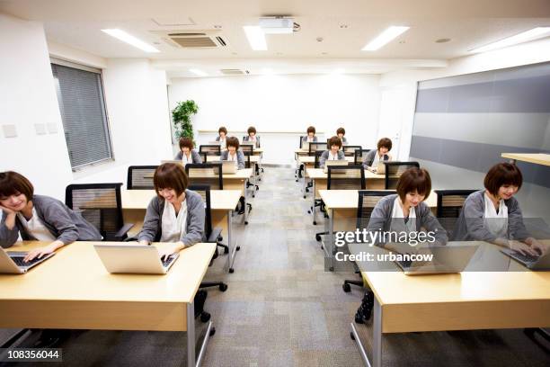 busy workers - japan training session stock pictures, royalty-free photos & images