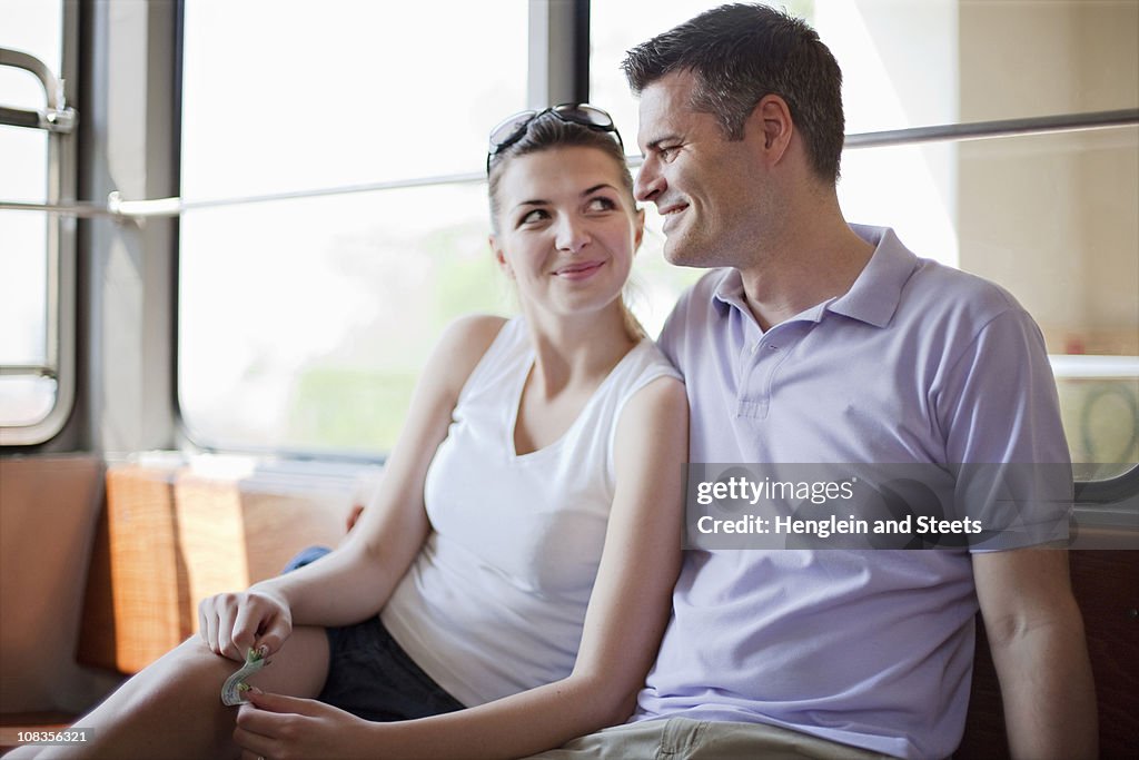 Couple travelling in funicular train