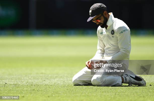 Virat Kohli of India reats during day four of the second match in the Test series between Australia and India at Perth Stadium on December 17, 2018...