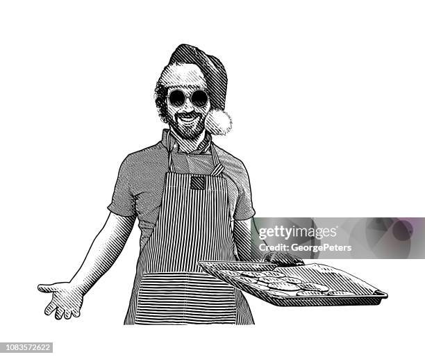 young man baking cookies - baking sheet stock illustrations
