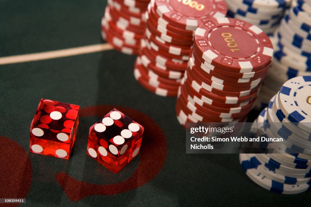 Close up of dice and gambling chips