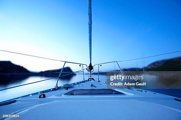 bow of boat sailing on lake - adam bow stockfoto's en -beelden