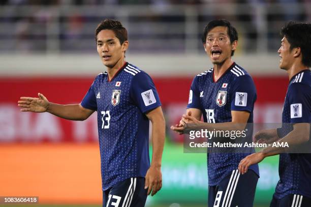 Yoshinori Muto of Japan celebrates scoring a goal to make it 1-1 during the AFC Asian Cup Group F match between Japan and Uzbekistsn at Khalifa Bin...