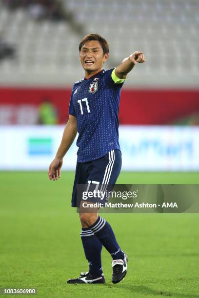 Toshihiro Aoyama of Japan in action during the AFC Asian Cup Group F match between Japan and Uzbekistsn at Khalifa Bin Zayed Stadium on January 17,...