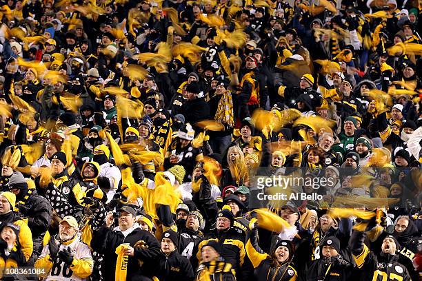 Pittsburgh Steelers fans wave terrible towels during their 2011 AFC Championship game against the New York Jets at Heinz Field on January 23, 2011 in...