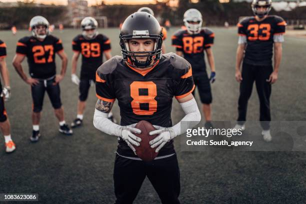 football players on training - college football player stock pictures, royalty-free photos & images