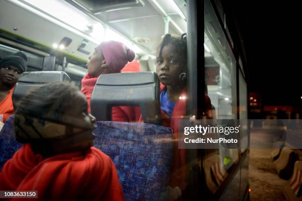 Two young girls with her mother inside a bus to be transferred to a center. Since the beginning of the year 2019, around 1300 rescued migrants have...