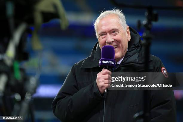 Commentator Martin Tyler speaks into a beIN Sports microphone before the Premier League match between Manchester City and Wolverhampton Wanderers at...