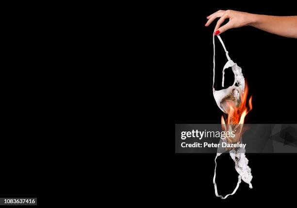 burning bra, feminism - clothes on fire stock pictures, royalty-free photos & images