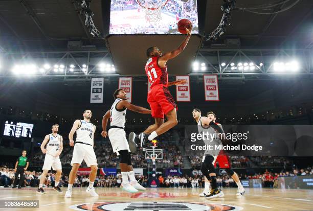 Bryce Cotton of the Wildcats shoots past DJ Kennedy of United during the round nine NBL match between the Melbourne United and the Perth Wildcats at...