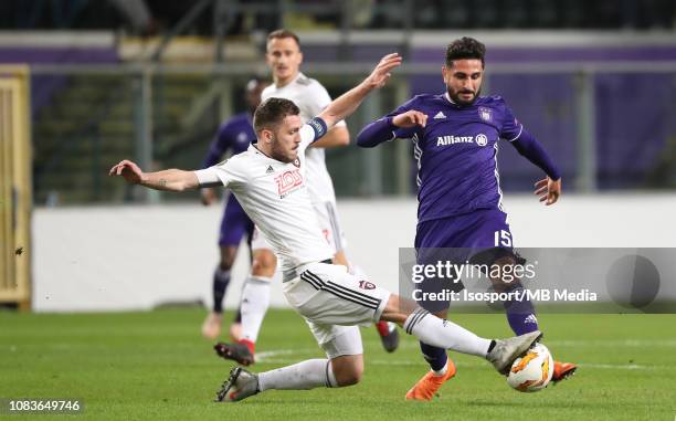 Lukas Gressak of Trnava and Kenny Saief of Anderlecht fight for the ball during the UEFA Europa League Group D match between RSC Anderlecht and FC...