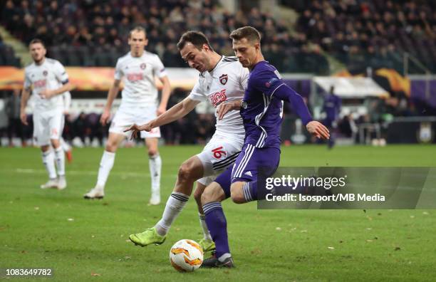 Davit Skhirtladze of Trnava and James Lawrence of Anderlecht fight for the ball during the UEFA Europa League Group D match between RSC Anderlecht...