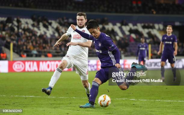 Jiri Kulhanek of Trnava and Ryota Morioka of Anderlecht fight for the ball during the UEFA Europa League Group D match between RSC Anderlecht and FC...