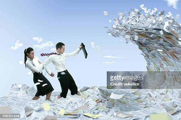 information flood - paper blowing stock pictures, royalty-free photos & images