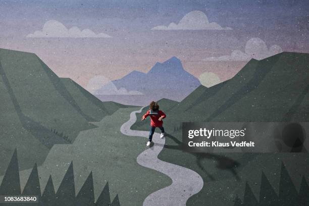boy wearing vr goggles walking on path in imaginary painted nature scenery - innocence stock pictures, royalty-free photos & images