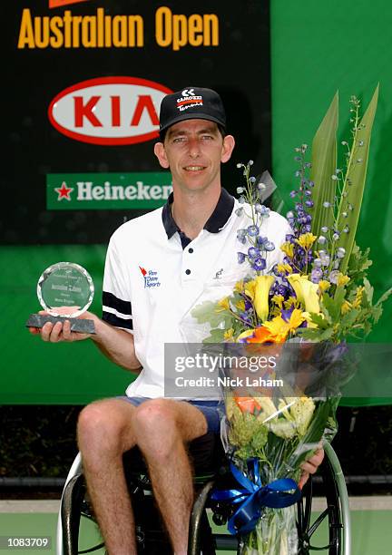 Robin Ammerlaan of The Netherlands celebrates as he defeats David Hall of Australia to win the Mens Wheelchair Singles Final during the Australian...