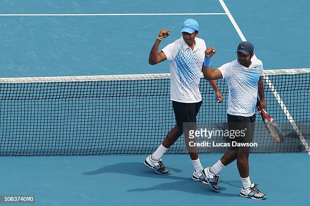 Mahesh Bhupati and Leander Paes of India celebrate winning their semi final match against Max Mirnyi of Belarus and Daniel Nestor of Canada during...