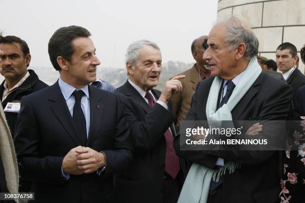 French President Nicolas Sarkozy inspects honor during a Delhi, 26 January 2008. Sarkozy is in India for a two-day visit during which he will be the...