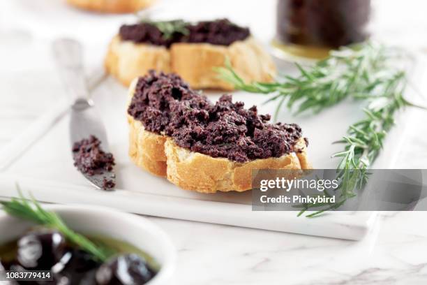 bread with olive pate,olive puree,black olive tapenade, - dip stock pictures, royalty-free photos & images