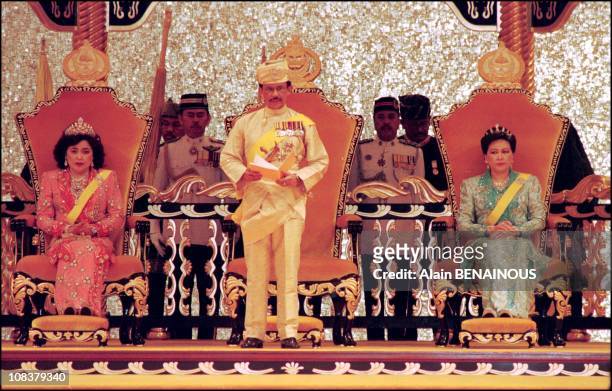 The Sultan gives a speech with his two queens, on his left side is her majesty Raja Isteri Pengiran Anak Pengiran Saleha and on his right side is her...