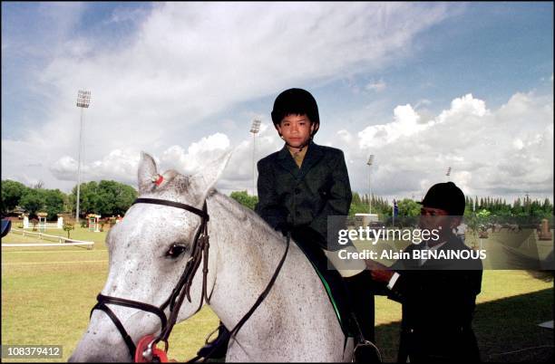 The first riding lessons during the horse racing contest of the young prince Abdul Malik in Brunei Darussalam on September 01, 2000.